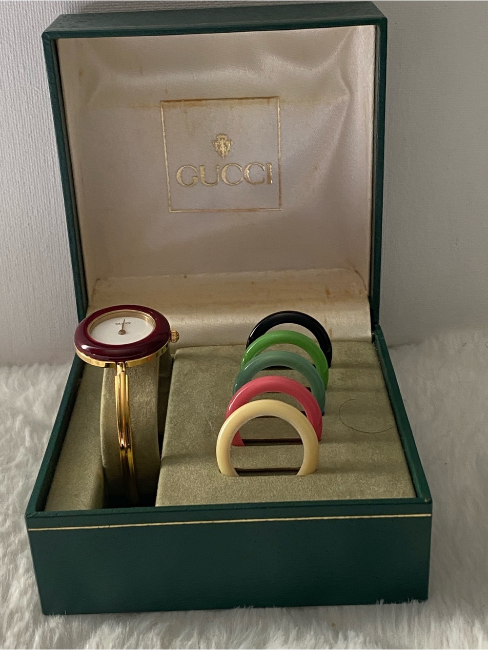 Gucci Gold Bangle Watch with Multicolor Interchangeable Bezels